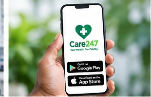 A hand holding a phone showing the Care247 app with app store badges
